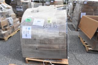 Plastic-wrapped booth on pallet labeled "BRAND NEW SCRATCH AND DENT," showing various handling labels and markings like "304 lb."