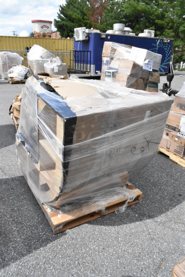 Brand new booth with scratch and dent damage, wrapped in plastic on a pallet. Visible cardboard and shipping markings.