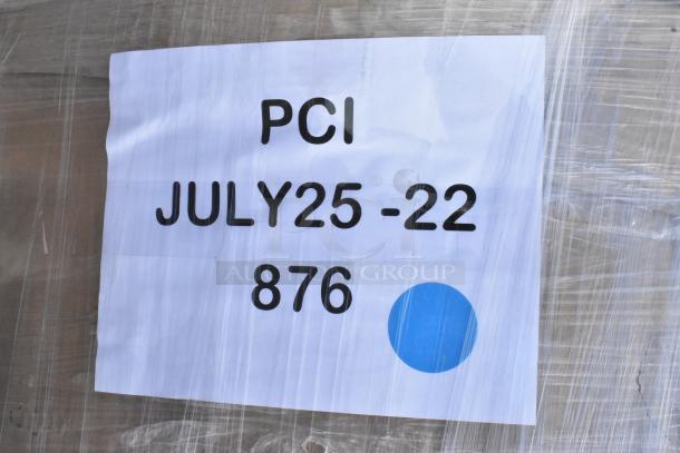 New booth, scratch and dent, labeled "PCI JULY25-22 876," partially wrapped in plastic.