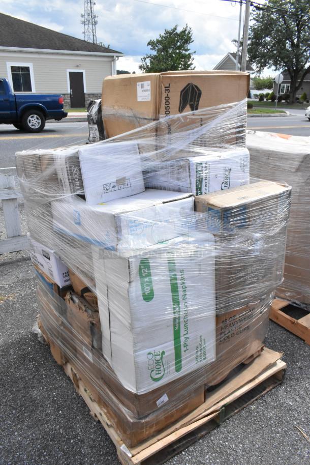 Pallet of 33 brand new items including deli wrap, paper towels, cold cups, lids. Wrapped in plastic, labeled as scratch and dent.