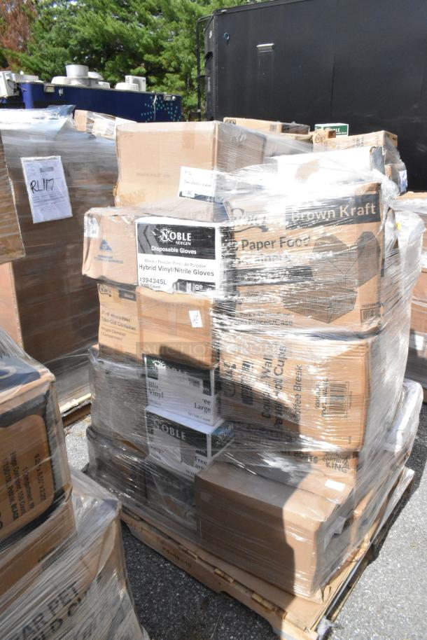 Boxes of various new items including gloves, paper towels, and food trays, shrink-wrapped on pallets, some labeled Noble and Carnival King.
