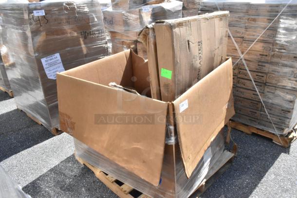 Cardboard boxes on pallets containing scratch and dent items, including a table, chafer cover, and trash cart. Labels visible.
