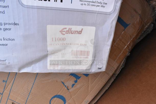 Box with Edlund 11000 label for #1 can opener less base, showing wear and barcode.