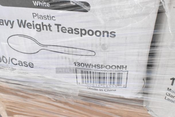 Stack of boxes reading "Heavy Weight Teaspoons, 130WH SPOONH, Made in China," wrapped in plastic. Scratch and dent condition.