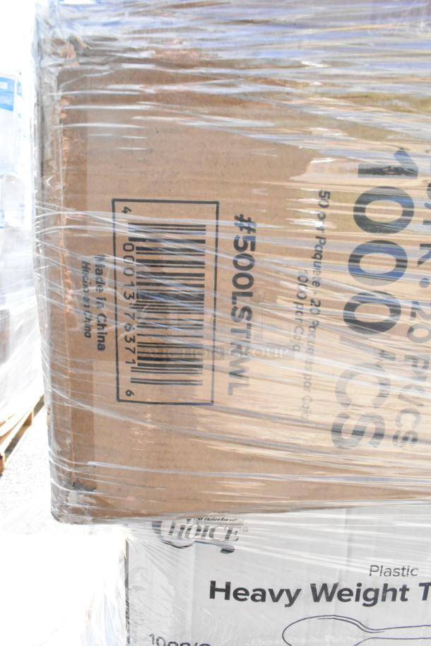 Boxes of assorted brand new scratch and dent items including frozen yogurt cups, teaspoons, and lids wrapped in plastic.
