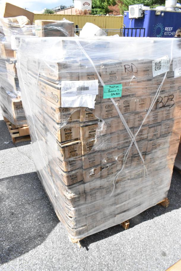 Pallet of 390 boxes of Choice Wide Mouth Lid for canning jars, wrapped in plastic, labels indicate new scratch and dent condition.