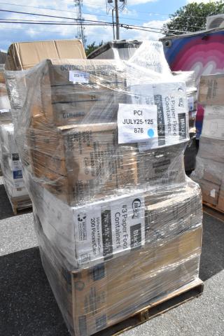 Pallet of 30 new scratch and dent items, including containers, napkins, paper towels, and cold cups, wrapped in plastic.