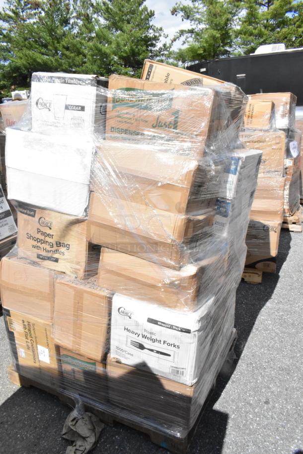 Pallet of assorted new items including containers, napkins, paper towels, cold cups, wrapped in plastic. Various brands visible.