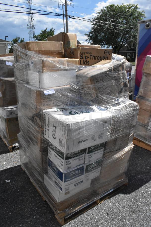 Pallet wrapped with boxes including plastic lids, cold cups, trash bags, and more. Various brands visible. 36 items.
