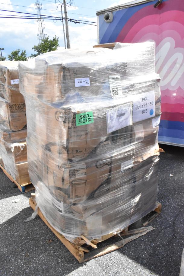 23 scratch and dent items on a pallet, including deli containers, paper plates, gloves, meat wrapping film, and cold cups.