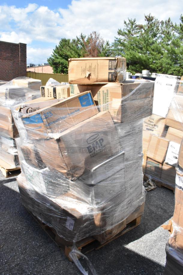 Pallet of assorted scratch and dent items including portion cups, paper plates, cone cups, and foam cups, wrapped in plastic.