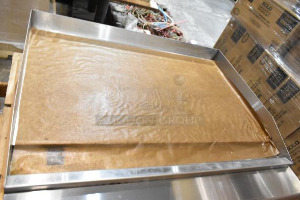 Brand new Therma-Tek TC36-36TGL stainless steel propane gas flat top griddle. Unopened packaging.