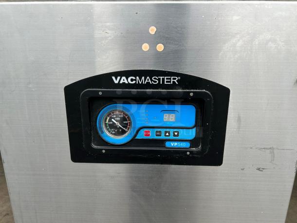VacMaster VP540 vacuum sealer, stainless steel, blue control panel, gauge, minor surface wear, auction item.