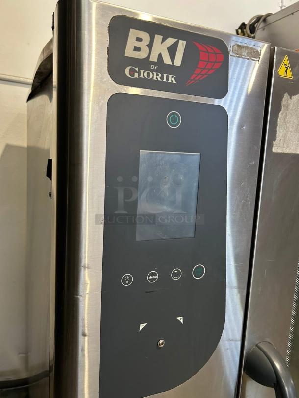 BKI by Giorik commercial oven, stainless steel finish, features digital controls, touch screen, used condition, model 132.