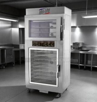 Nu-Vu commercial oven with stainless steel finish, double glass doors, and control panel. Features multiple baking racks.