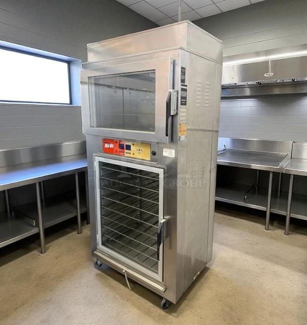 Nu-Vu commercial oven and proofer 137, stainless steel, dual glass doors, digital controls, multiple racks, on wheels, excellent condition.
