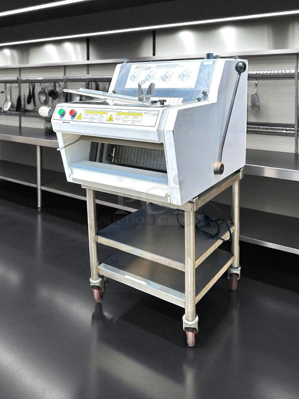 Antunes Roundup bread slicer on stainless steel cart, used condition, operational buttons and warning labels visible, model 139.
