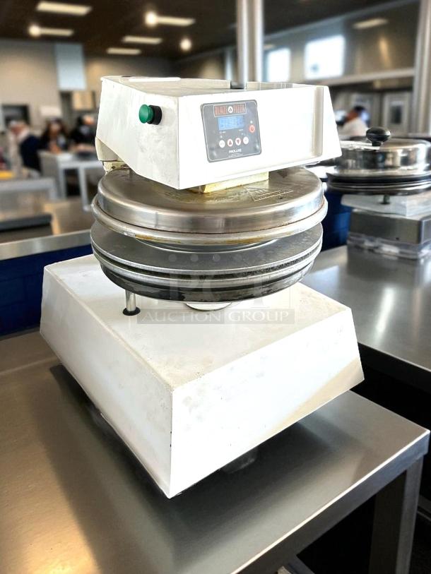 Blaze Pizza Proluxe dough press in stainless steel, featuring control panel and sturdy base, gently used condition.
