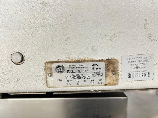 Berkel Company bread slicer, Model MB 1/2, Serial 9213-03306-9492, 115 volts, UL certified label visible.