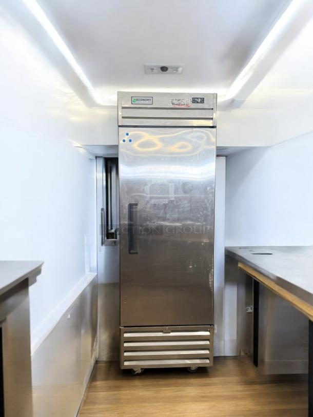 Economy Series EF1A-FS single door commercial freezer, excellent condition, stainless steel, 115V, fully tested.