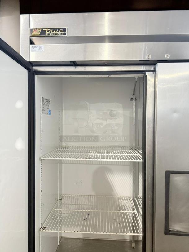 True T-49-HC double door reach-in refrigerator in excellent condition. Stainless steel exterior, fully tested, 115V.