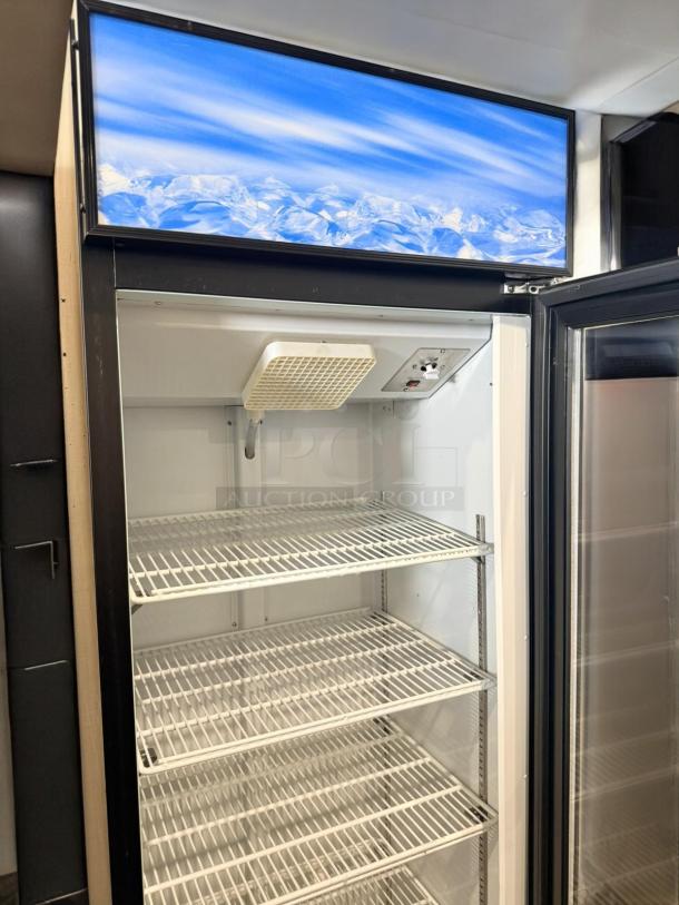 Atosa Model 178GDC15 glass door merchandiser refrigerator in excellent condition, features multiple shelves, 115V, fully tested.