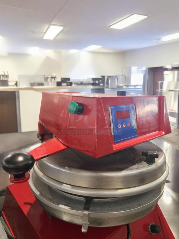 Commercial Line Heavy-Duty Dough Press, single plate, red, 120V, excellent condition, fully tested and working.