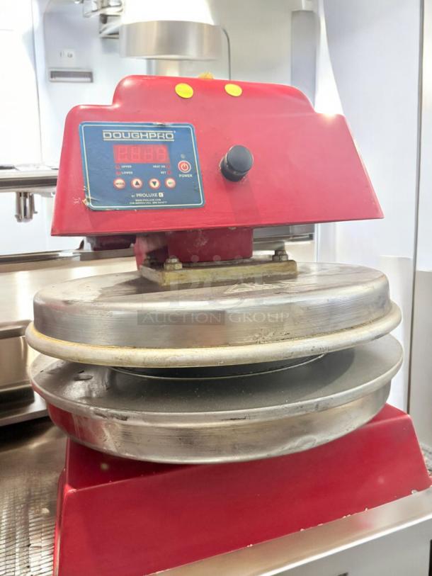 DoughPro ProLuxe pizza dough press, excellent condition, with heated platens and digital control panel, 120V, fully tested.