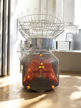 Citrocasa Commercial Pro Juicer in stainless steel, excellent condition, with cabinet base. Fully tested and working, model tag visible.