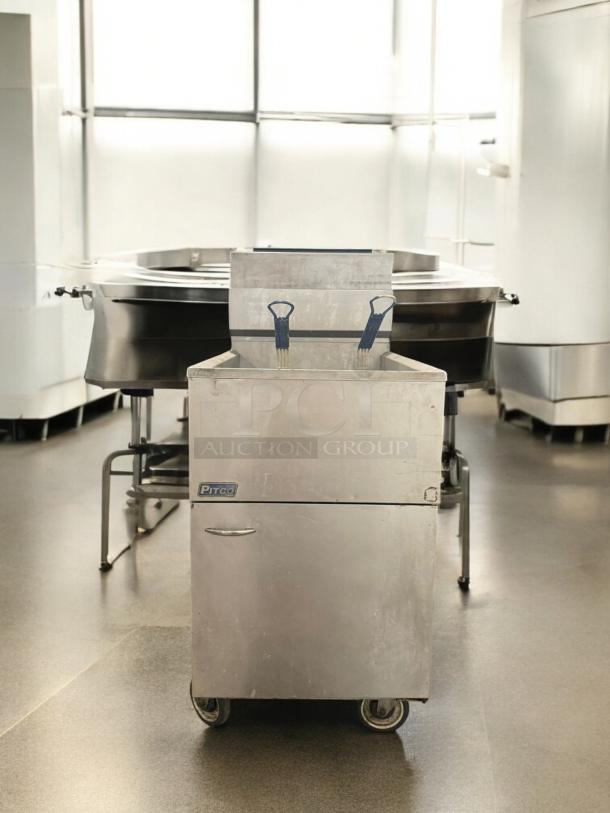 Pitco 65C+S natural gas fryer, 65 lb capacity, excellent condition, floor model, fully tested and working, with visible logo.