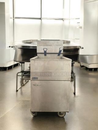 Pitco 65C+S natural gas fryer, 65 lb capacity, excellent condition, floor model, fully tested and working, with visible logo.