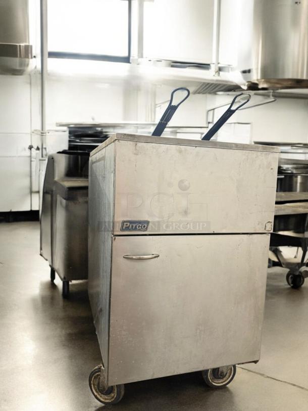 Pitco 65C+S 65 lb natural gas fryer, excellent condition, floor model, fully tested. Features stainless steel body and visible Pitco label.