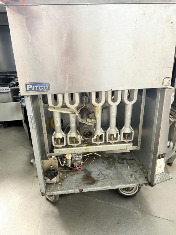Pitco 65C+S 65 lb natural gas fryer, floor model, excellent condition, tested and working, visible wiring and components.