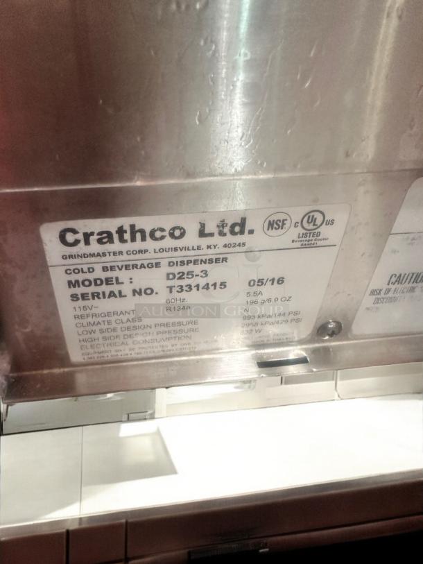 Crathco D25-3 triple bowl refrigerated beverage dispenser label, showing model, serial number T331415, 115V specs.