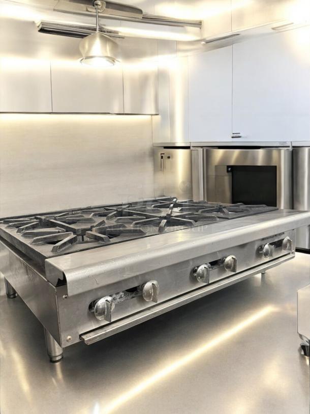 Imperial 6-burner gas hot plate in excellent condition, natural gas, 120V ignition, fully tested and working, model shown.