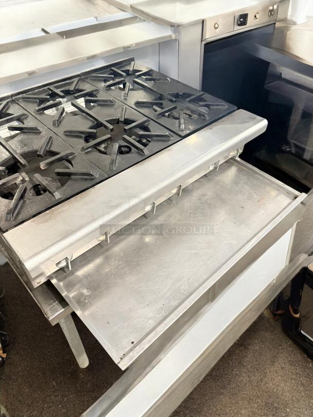 Imperial 6-burner gas hot plate in excellent condition, natural gas, 120V ignition, fully tested and working.