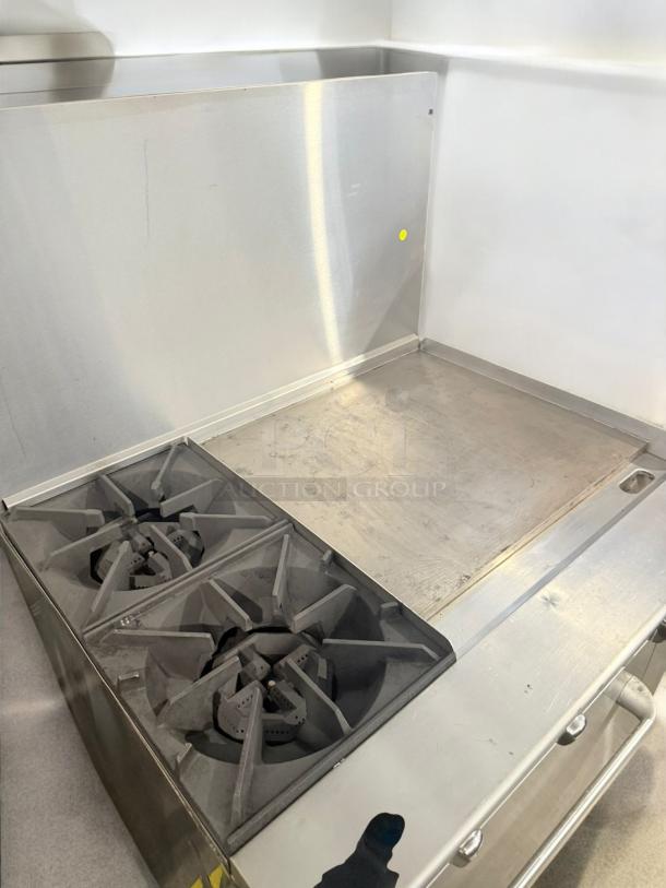 American Range 36" gas range, model ATO-2824, with 2 burners, 24" griddle, and standard oven. Excellent condition.