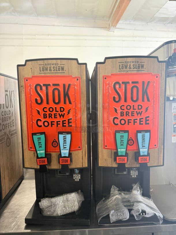STōK Dual Flavor Cold Brew Coffee Dispenser, excellent condition, fully tested, 120V, offers black and vanilla options.
