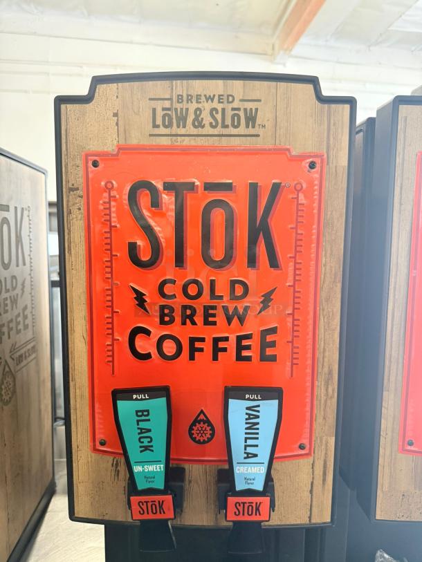 STōK Dual Flavor Cold Brew Dispenser, excellent condition, 120V, offers black and vanilla flavors, fully tested and working.