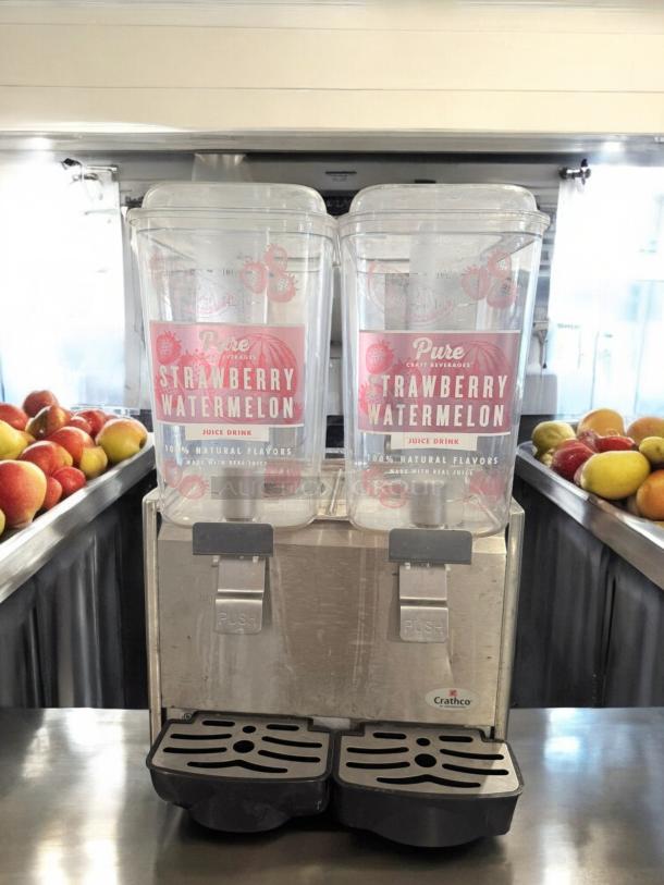Crathco Dual Bowl Beverage Dispenser, Classic Series, 120V. Excellent condition, fully tested. Visible labels for juice flavors.