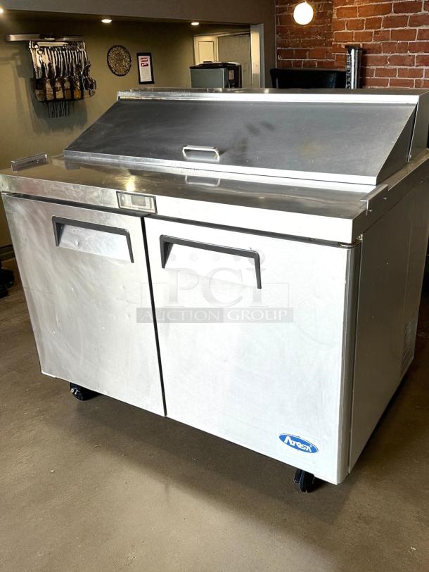 Atosa USA MSF8302GR 48" sandwich/salad prep table, two sections, 2 doors, 12 pans, 13.4 cu. ft., great condition, tested.
