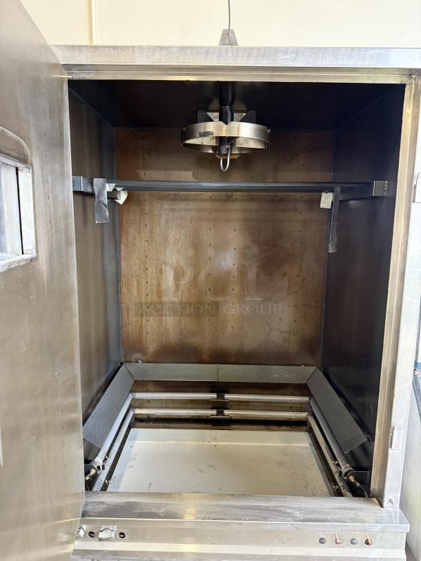 Stainless steel Chinese BBQ oven by CHINA PACIFIC CO., INC., model EQ-36L, left hinge, tested and working condition.