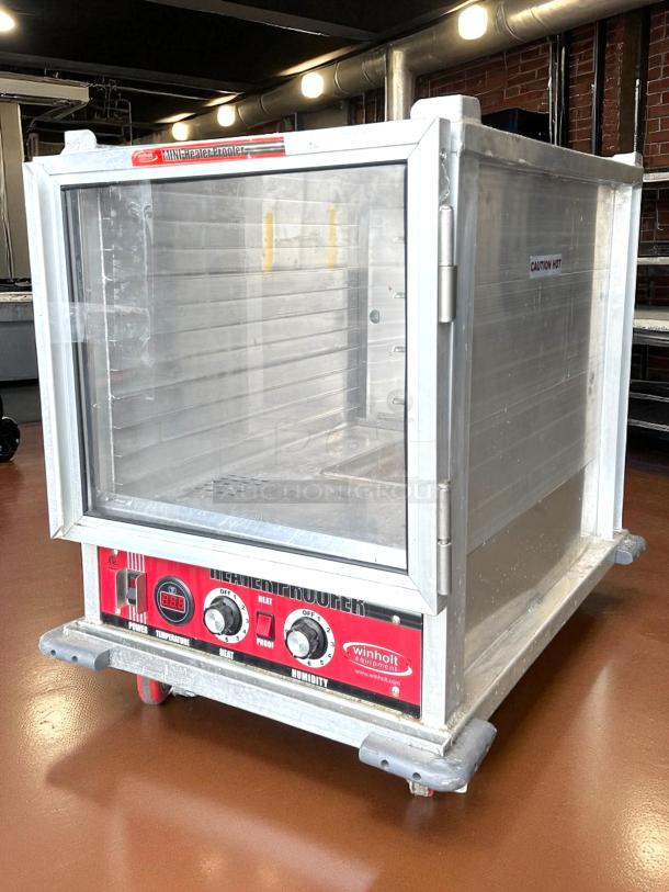 Win-Holt NHPL-1810/HN-CA/LC heater/proofer cabinet in perfect condition. Features adjustable knobs, visible front panel markings, and durable construction.
