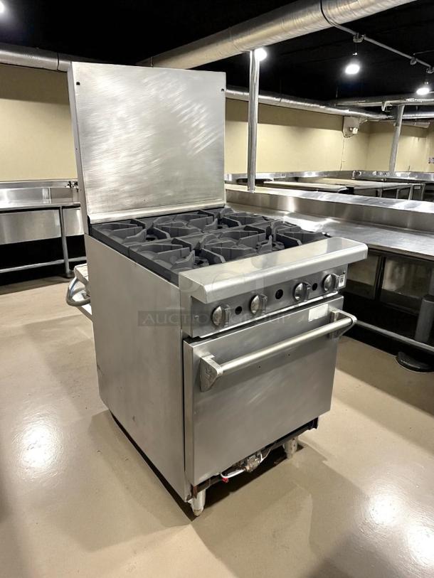 American Range AR-4 24" natural gas 4-burner range, excellent condition, space-saver oven, 155,000 BTU, tested and working.