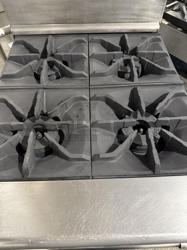 American Range AR-4 24" 4-burner natural gas range, excellent condition, tested and working, 155,000 BTU.