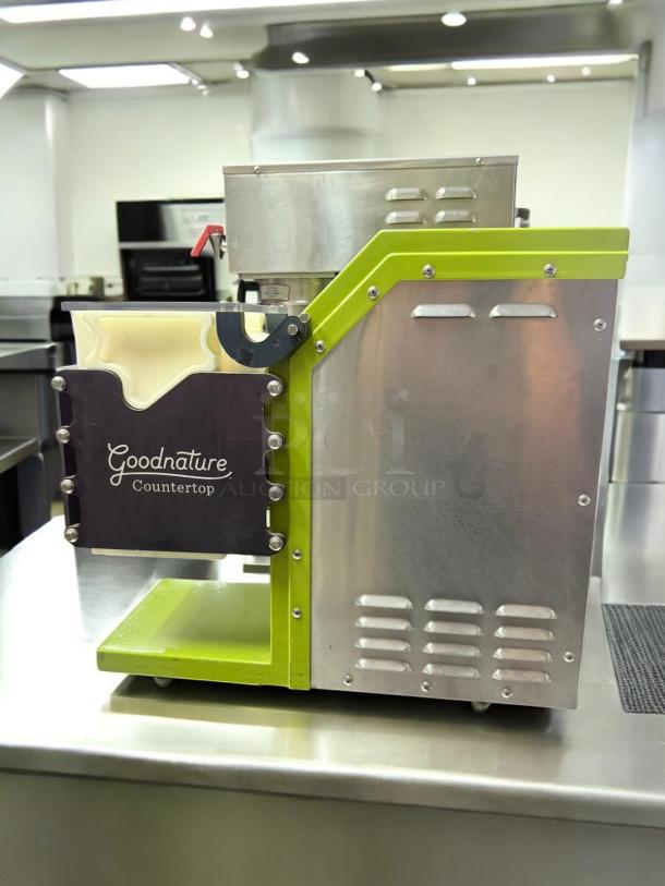 Goodnature CT7 Countertop Cold Press Juicer, 115V, excellent condition, stainless steel body, visible brand logo, fully tested.