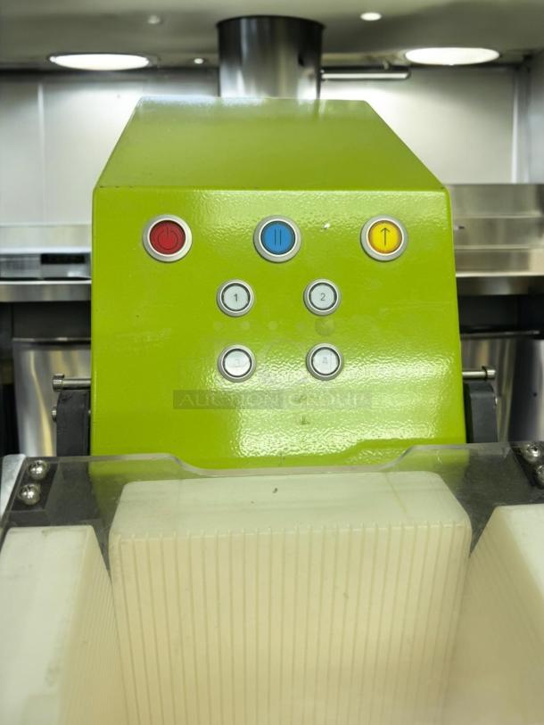 Goodnature CT7 Countertop Cold Press Juicer in excellent condition, vibrant green control panel, buttons intact, 115V.
