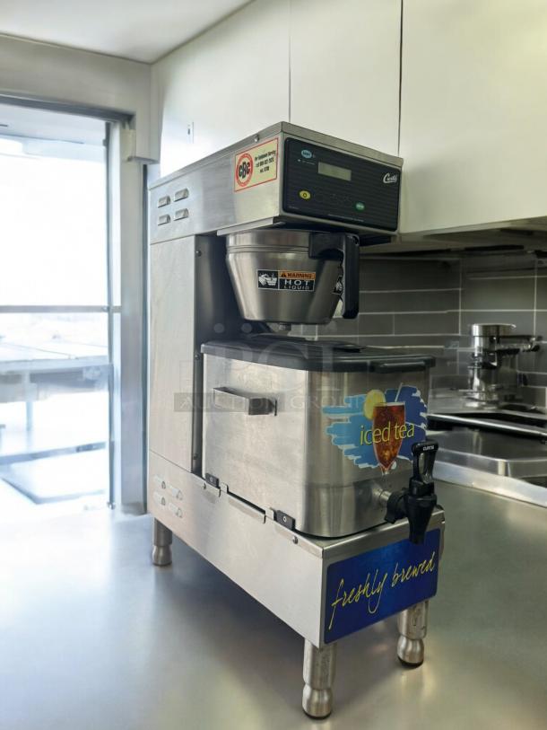Curtis Commercial Iced Tea Brewer with Dispenser, excellent condition, 120V, fully tested, stainless steel, bold labeling.