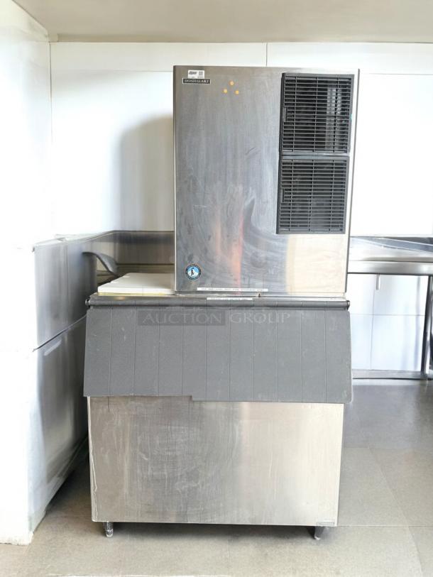 Hoshizaki commercial ice maker with bin in excellent condition, 115V, fully tested and working, visible brand label.