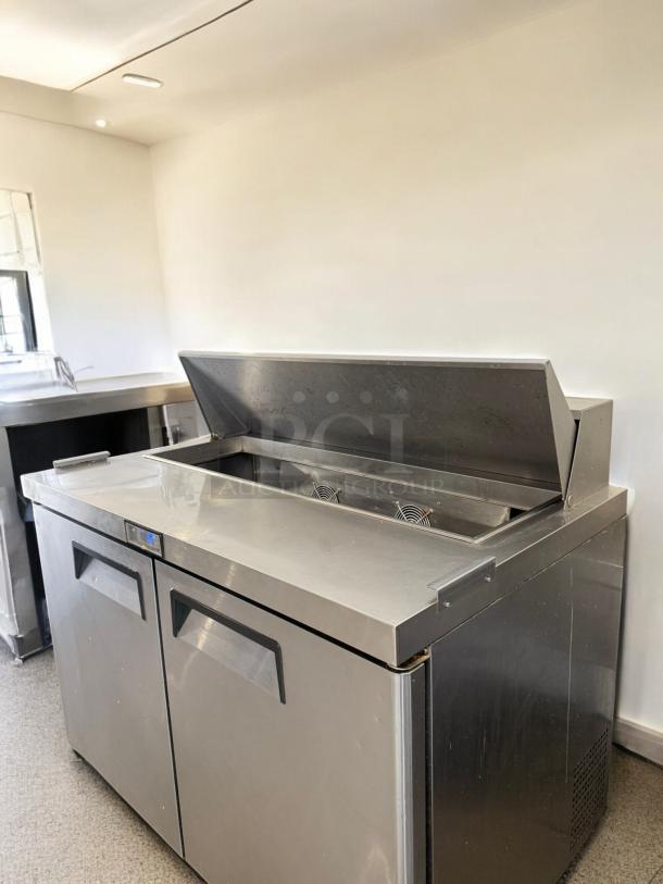 Turbo Air Prep Table Refrigerator, Model MSR-49NM, in excellent condition. Stainless steel, 115V, fully tested and working.